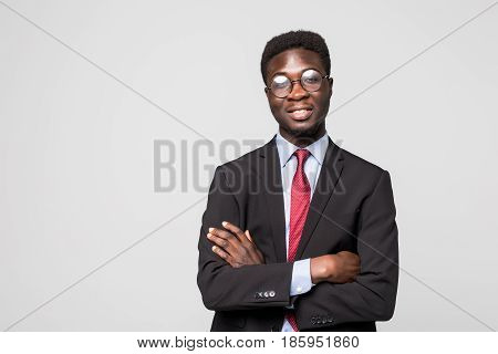 Portrait Of African American Business Man With Folded Arms, Isolated On Greybackground