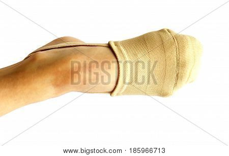 Rhythmic gymnastics shoes worn on white background.