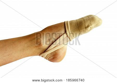Rhythmic gymnastics shoes worn on white background.