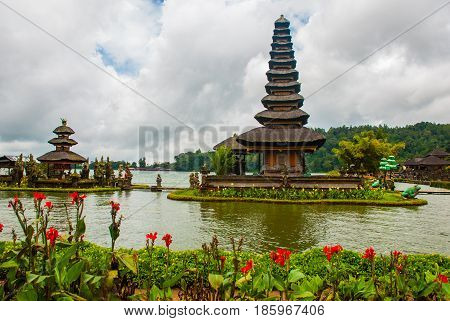 Pura Ulun Danu Batur Temple In Lake With Flowers. Bali, Indonesia.