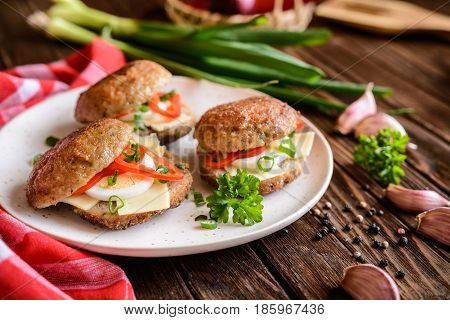 Fried Patty Filled With Cheese, Egg, Bell Pepper And Scallion