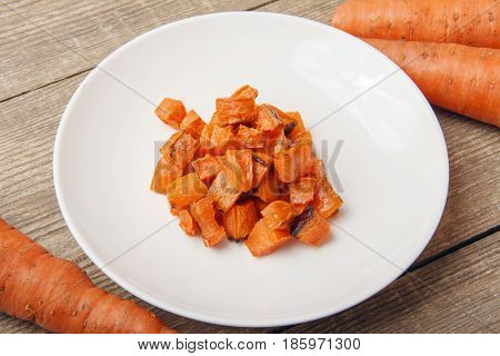Baked carrots for a vegetable salad. Ingredients for cooking healthy food from organic products