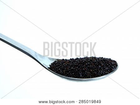 The Vegetable Seeds On A Stainless Spoon