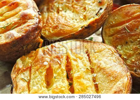 Baked Potato Halves. Ruddy Baked Potatoes In The Peel.