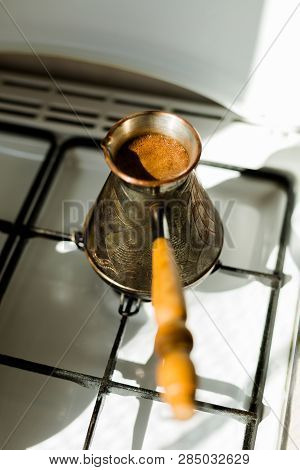 Making Black Coffee In Cezva For The Breakfast In The Early Morning.