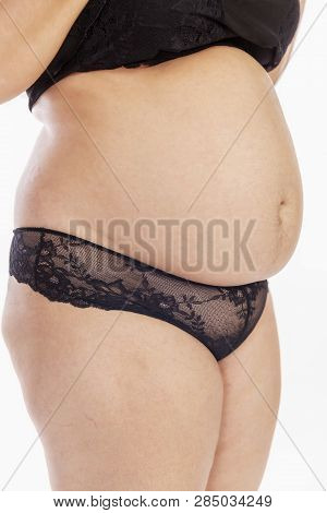 Thick Female Body In Underwear, Close-up, Vertical