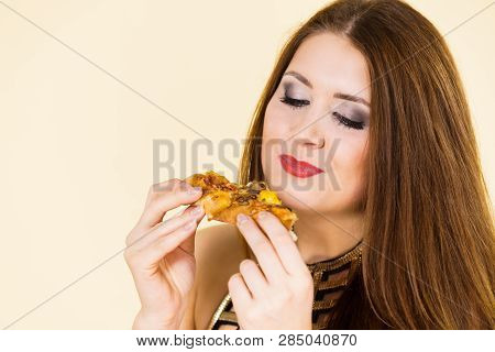 Woman Eating Hot Pizza Slice