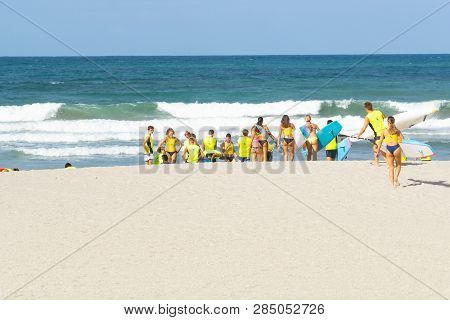 Mount Maunganui New Zealand - February 8 2019: Members Mount Maunganui Surf Lifesavers Club Head Dow