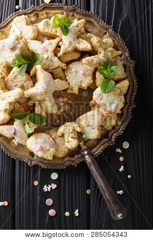 Christmas Mexican Cookies Hojarascas Or Biscochitos, Pan De Polvo And Polvorones Closeup On A Plate.