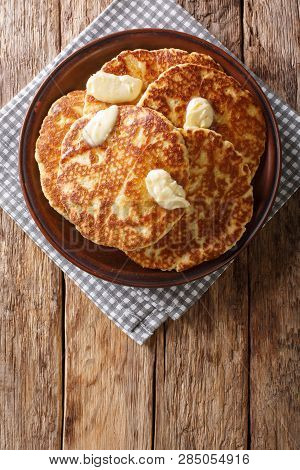 Gorditas De Azucar (sweet Griddle Cakes) With Butter Close-up On A Plate. Vertical Top View