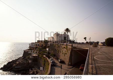 Sunset On Soccorso Church In Forio, Part Of Ischia Island