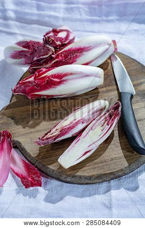 Group Of Fresh Red Radicchio Chicory Or Belgian Endive Vegetables, Also Known As Witlof Salade