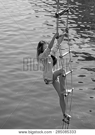 Ambition Can Move Mountains. Sexy Woman Climbing Up Rope Ladder. Pretty Woman Climb Jacobs Ladder To