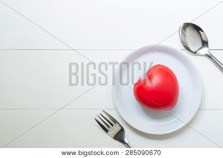 Red Heart With Love And Dish And Spoon And Fork On Wooden Background, 14 February Valentine Day, On 