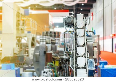 Close Up Modern Buckets Chain Or Bowl Commercial Conveyor (cup Feeder) For Food Or Material Transpor