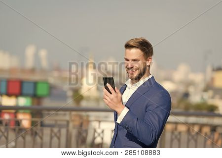 Businessman Happy Smiling Use Smartphone For Video Call Or Texting, Skyline Background. Business Cal