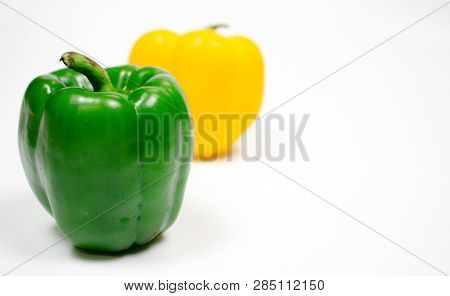 Bell pepper or capsicum in white background, yellow, red, green bell pepper.