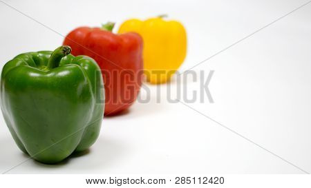 Bell Pepper Or Capsicum In White Background, Yellow, Red, Green Bell Pepper.