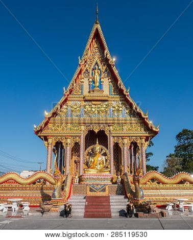 Wat Huai Yai, A Buddhist Temple With A Golden Buddha Image In Front Of It In Huai Yai, Close To Patt