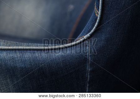 Denim Chair. Modern Armchair Over Rustic Wall In Living Room Interior Redecoration Renovation Concep