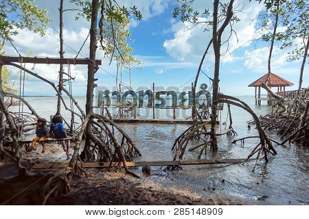 Trad, Thailand - December 01, 2018: Check In Point Of Black Sand Beach With Thai Post 