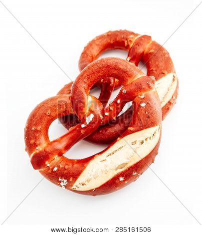 Two Traditional Bavarian Pastry Bretzes, Beer Snack. German Salty Bakery Pretzel, Isolated On White 