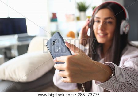 Minsk, Belarus - February 16, 2019 : Woman Holding Smartphone Samsung Galaxy S8 In Hand Illustrative