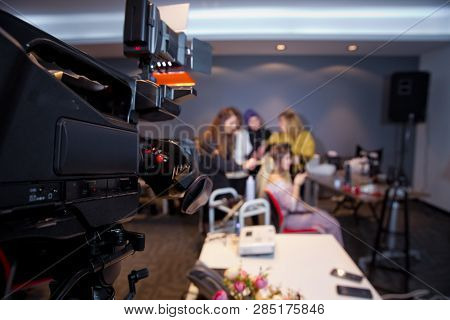 Makeup Cosmetic At Home. Focus On Tripod Mounted Video Camera Screen Showing . In Front Of The Camer