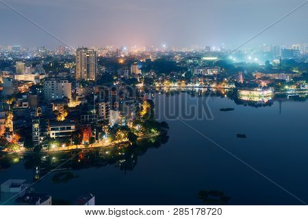 Hanoi Vietnam Aerial Cityscape View At Night. City Urban Skyline Of Old Town District