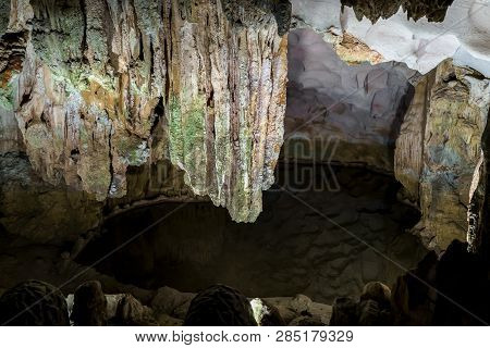 Cave Deep Dark Inside. Underground Of Stone Rock Mountain. Ha Long Vietnam Nature Background