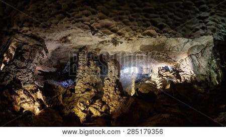 Cave Deep Dark Inside Near Entrance. Panoramic View. Underground Of Stone Rock Mountain. Ha Long Vie