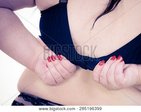 Fat Woman Rear View Opening Taking Off Or Putting On Her Bra. Plus Size Overweight Female Model Wear