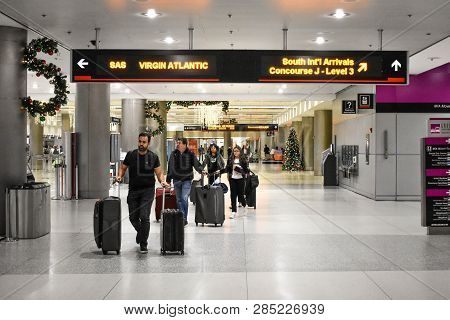 Miami, Florida. January 05, 2019. People Walking With Suitcases At Miami International Airport (2)