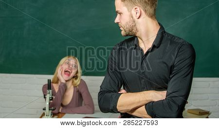 Answering Home Assignment. Male Student With Examiner At Examination. Handsome Man Standing Hands Cr