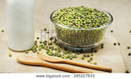Mung Beans On Glass Bowl With Bottle Of Milk.