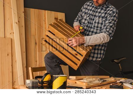 Carpenter Making Wooden Crate In Small Business Woodwork Workshop, Craftsman Working On Diy Project