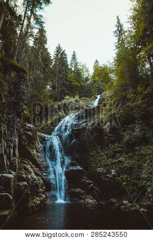 Scenic View Of Kamienczyk Waterfall In Gian Mountain, Karkonosze In Poland