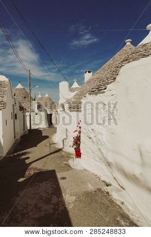 Traditional Trulli Houses In White Oldtown Of Arbelobello, Sauthern Italy