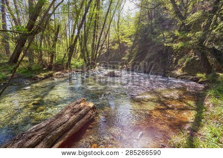 Water Flowing In A Mountain River Creating Small Waterfalls At Troodos Mountains, Cyprus