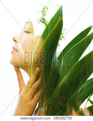 Bright aspects of nature are highlighted along with her peaceful and relaxed expression