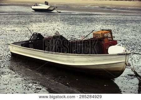 Boat Filled With Oyster Farming Tools (rakes And Crates) Wellfleet Harbor On Cape Cod In Wellfleet M