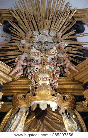 WURZBURG, GERMANY - JULY O4, 2018: Holy Spirit Bird, Virgin Mary altar in the Neumunster Collegiate Church in Wurzburg, Germany