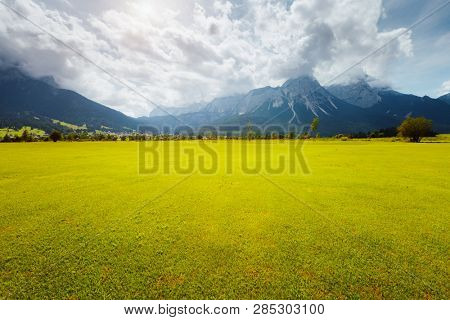 Splendid green golf course in Lermoos village. Location place Austrian Alps, Tyrol, Reutte district, Austria, Europe. Scenic image of most popular vacation destinations. Discover the beauty of earth.
