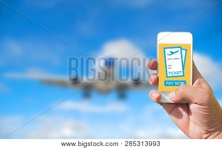 Using Mobile Smart Phone Buy Ticket Airport Flight. Airplane Background Bulr