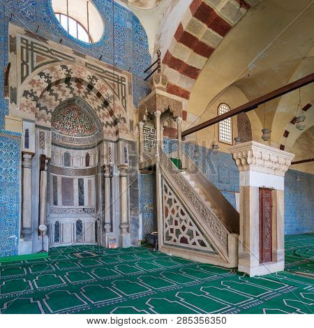 Cairo, Egypt - January 8 2019: Blue, Iznik Ceramic Tiles Wall With Engraved Mihrab (niche) And Decor
