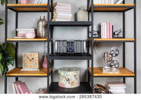 Compact Cd Radio Player On The Shelf In The Vintage Interior Of The Living Room