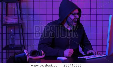 Gamer Cries Going Crazy Of Defeat In The Video Game Hitting Table With His Fist.
