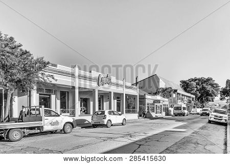 Clanwilliam, South Africa, August 28, 2018: A Street Scene, With Businesses, Vehicles And People, In