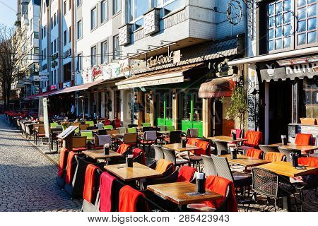 Street With Restaurants In The Old Town Of Cologne, Germany