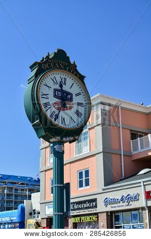 Ocean City, Maryland - April 3, 2018: Classic Analog Clock On The Ocean City Boardwalk Gives Visitor